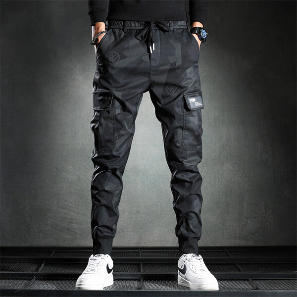 Relaxed fit men's camo cargo pants. Ideal for casual everyday wear, offering comfort and rugged military style.