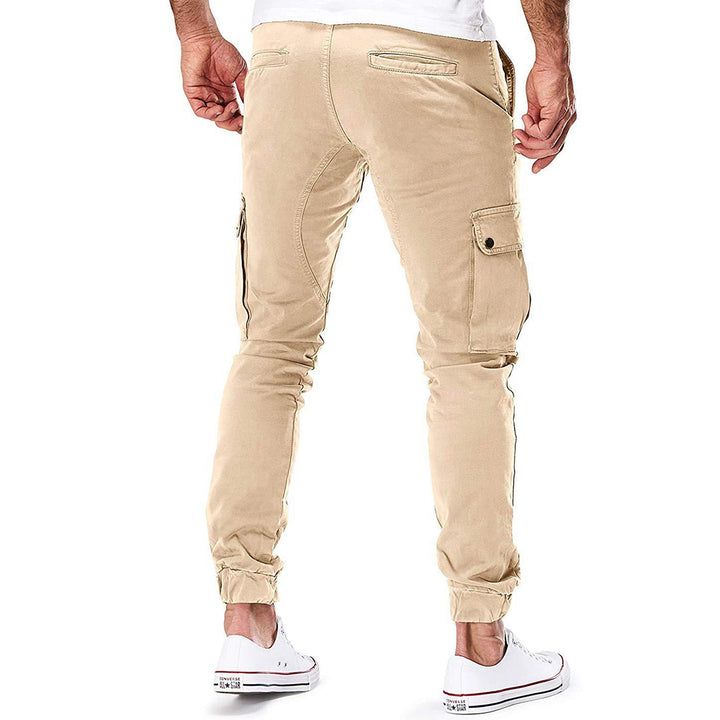 Stylish men's cargo pants, dark color, for casual fashion & practical everyday use with many pockets.