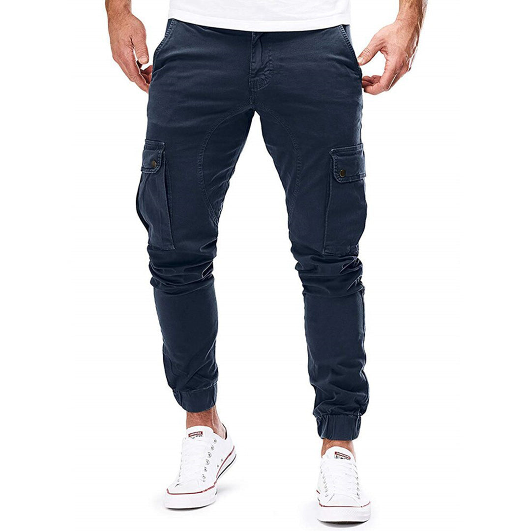 Men's durable everyday cargo trousers, detail of back pockets, offering practicality and comfort.
