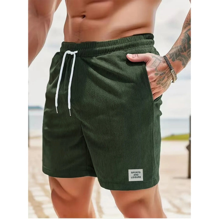 Relaxed fit men's corduroy shorts, comfortable for warm weather & versatile daily wear.
