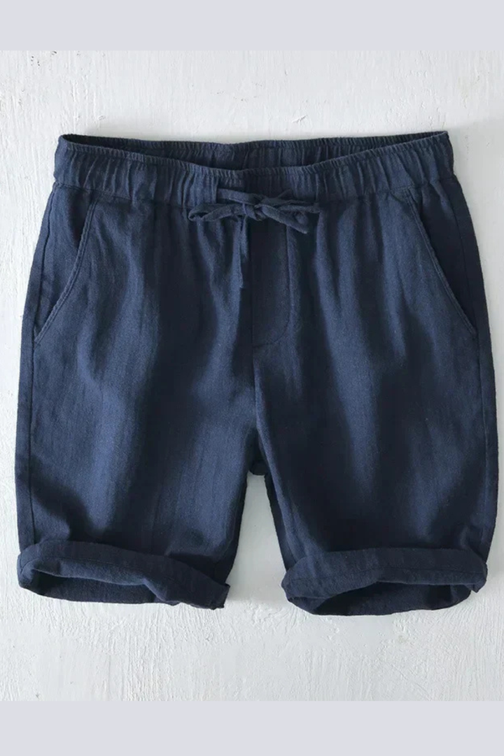 Relaxed fit men's knee-length shorts, elastic waist, drawstring, offering everyday comfort.
