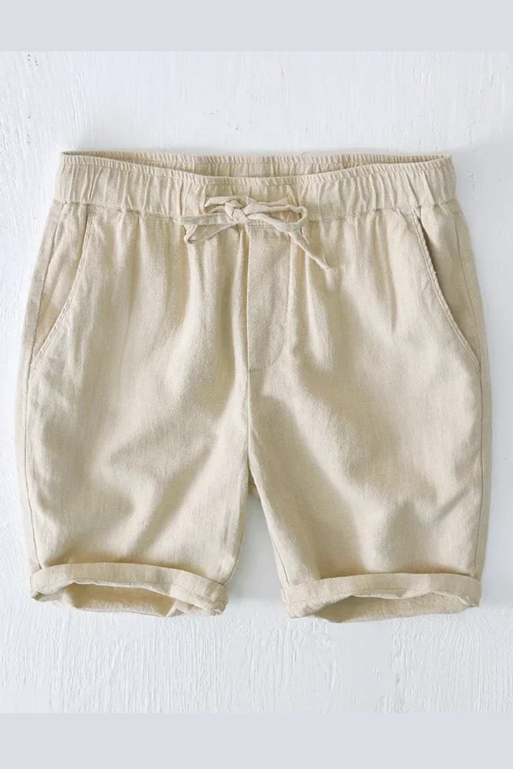 Comfortable men's summer shorts featuring an elastic waist, drawstring, and knee-length design.