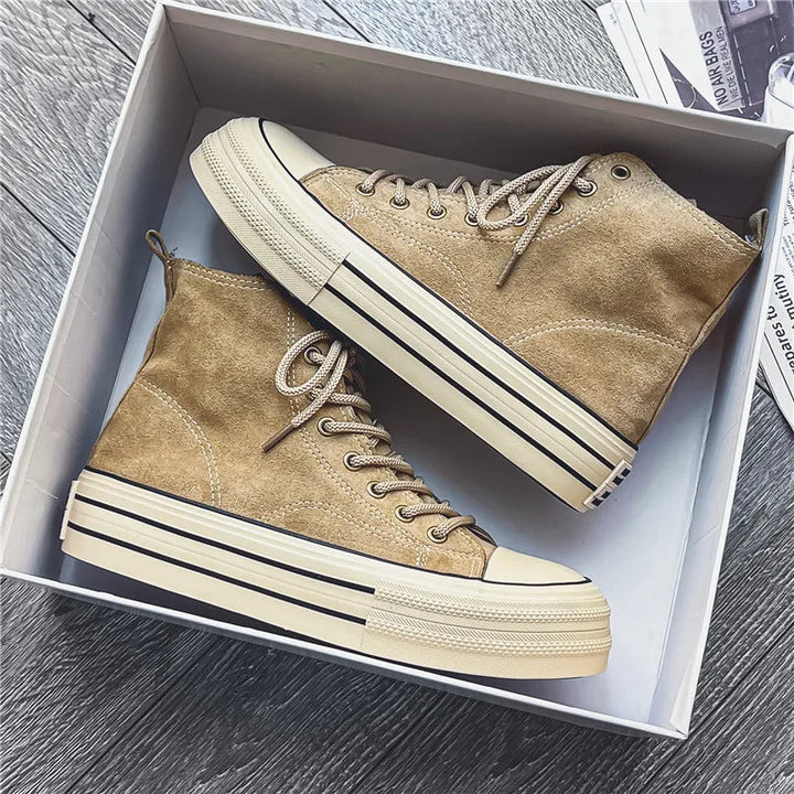 Modern men's casual high-top trainers with platform sole, offering style & comfort for street fashion.
