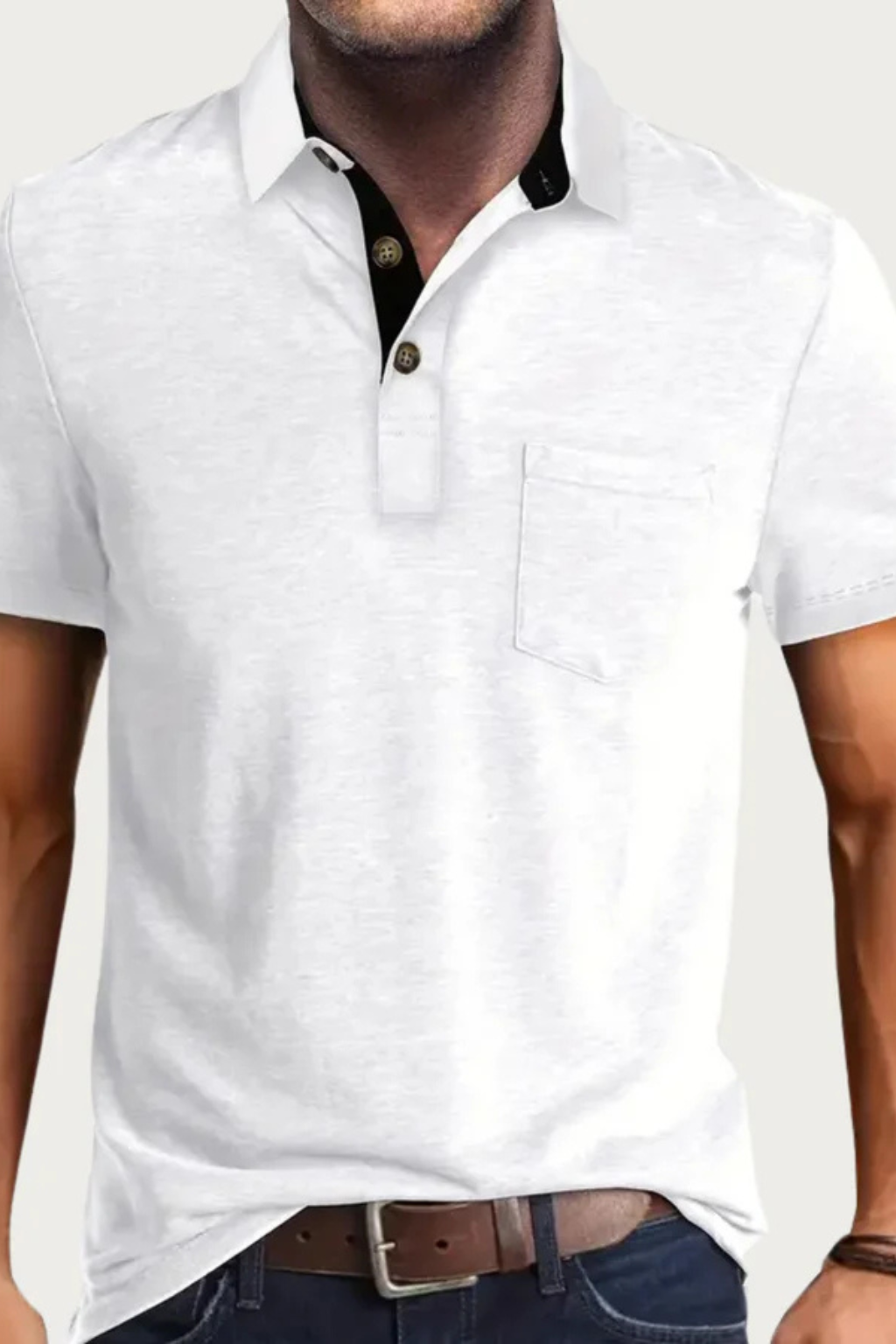 Stylish men's polo shirt, short sleeve, contrast collar. Features a button placket & chest pocket.
