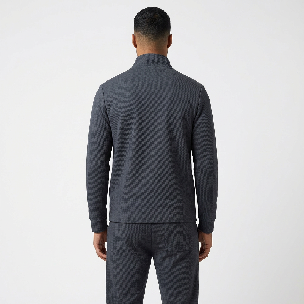 Comfortable men's tracksuit set: full-zip jacket and relaxed joggers, great for a sporty casual look.