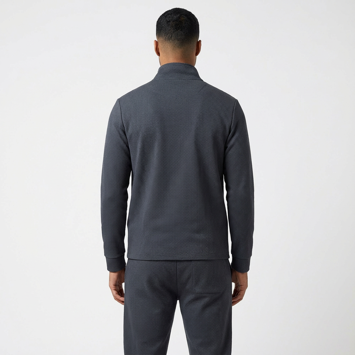Comfortable men's tracksuit set: full-zip jacket and relaxed joggers, great for a sporty casual look.