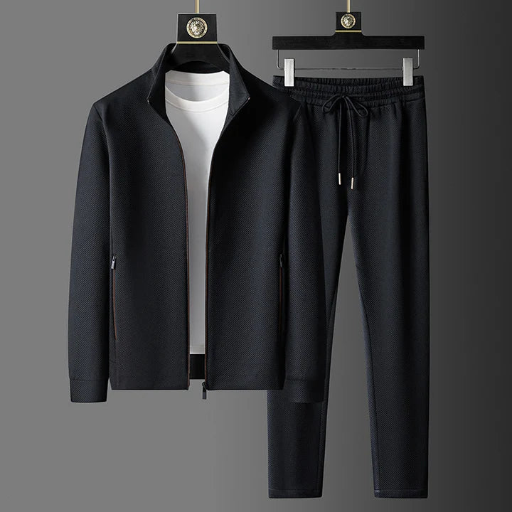 Stylish men's fashion tracksuit set. Zip-up jacket and matching joggers for a modern sporty look.