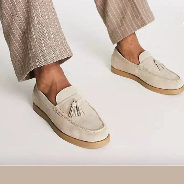 Beige men's slip-on dress loafers, perfect for versatile everyday style, from casual outfits to formal events.