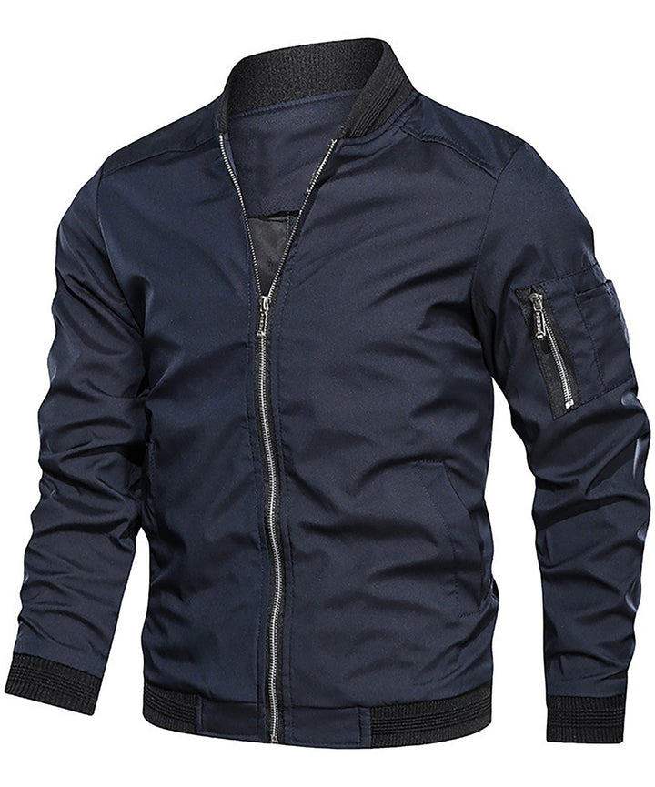 Classic men's navy bomber jacket with a functional sleeve zip pocket & ribbed cuffs. Perfect casual wear.