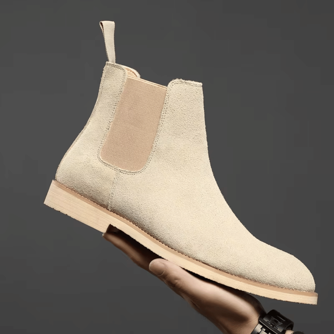 Men's classic black leather Chelsea boots, timeless slip-on ankle boots for versatile smart casual style.