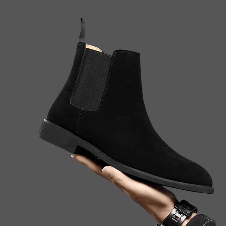 Comfortable men's brown suede Chelsea boots, ideal for everyday wear, easy slip-on ankle style.