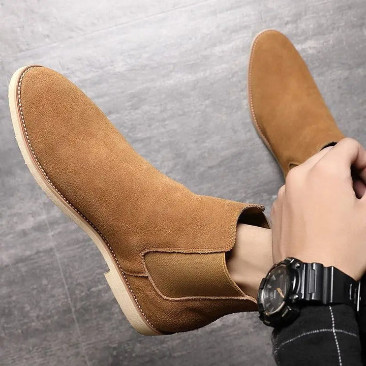 Modern classic men's grey suede Chelsea boots, comfortable slip-on ankle boots for a refined everyday look.