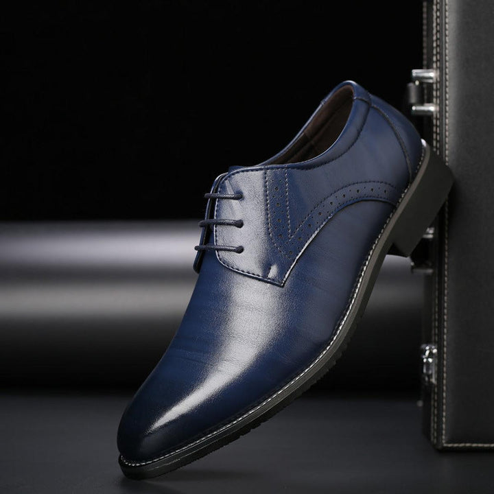 Elegant men's black leather lace-up Oxfords, ideal for business attire, weddings, and formal events.
