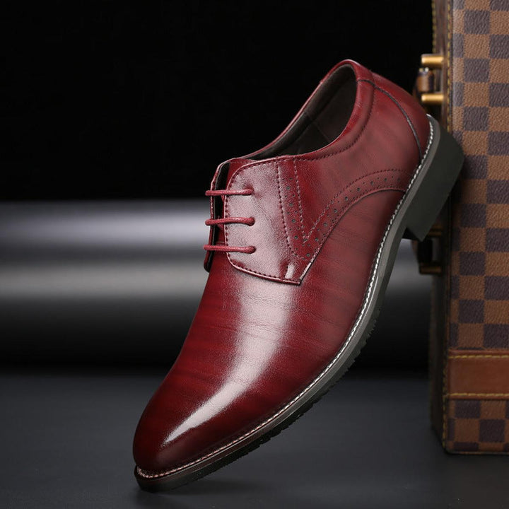 Classic men's lace-up dress shoes, offering sophisticated style for formal wear and professional settings.