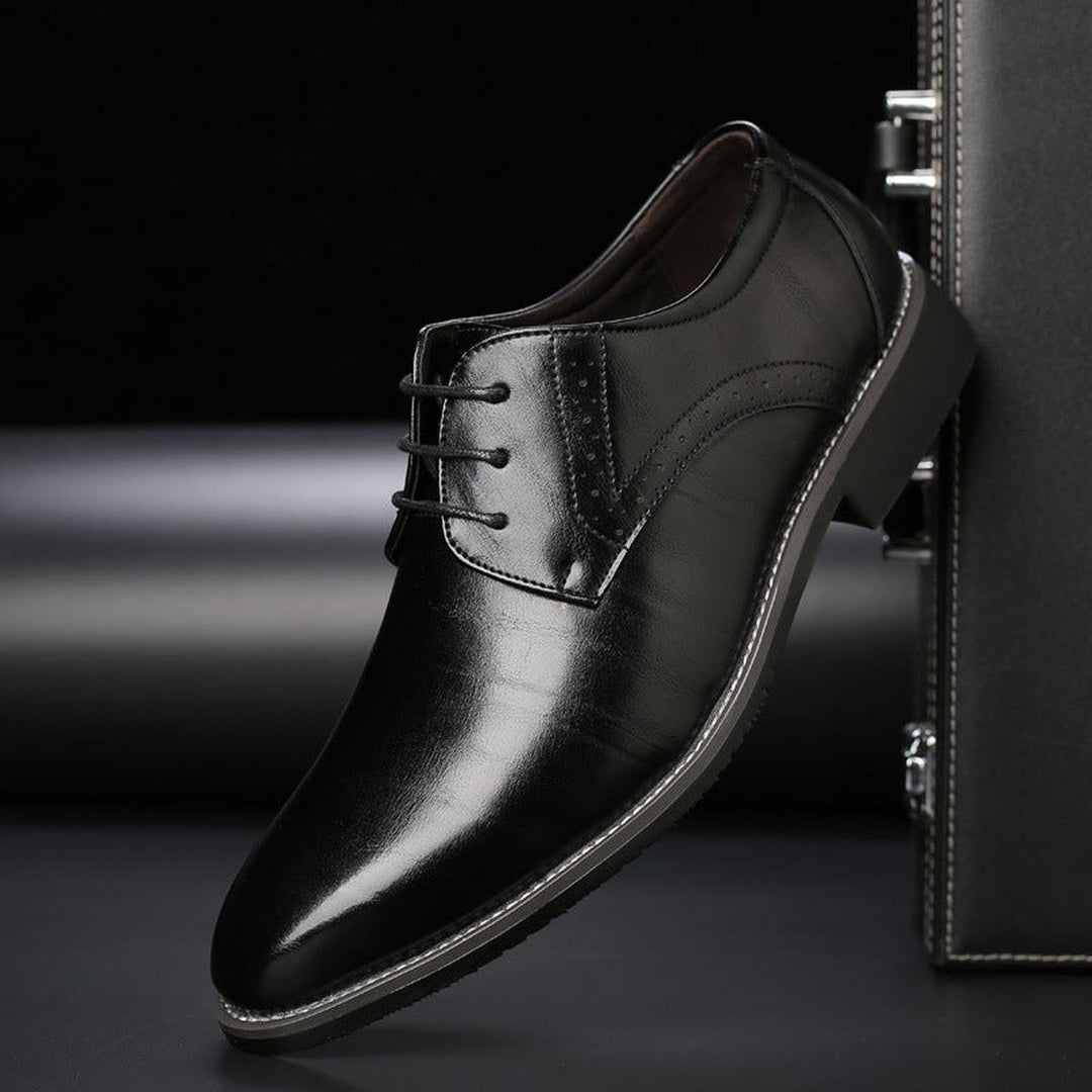 Men's elegant black lace-up dress shoes, classic formal footwear for business, weddings & office attire.