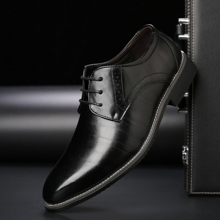 Men's elegant black lace-up dress shoes, classic formal footwear for business, weddings & office attire.