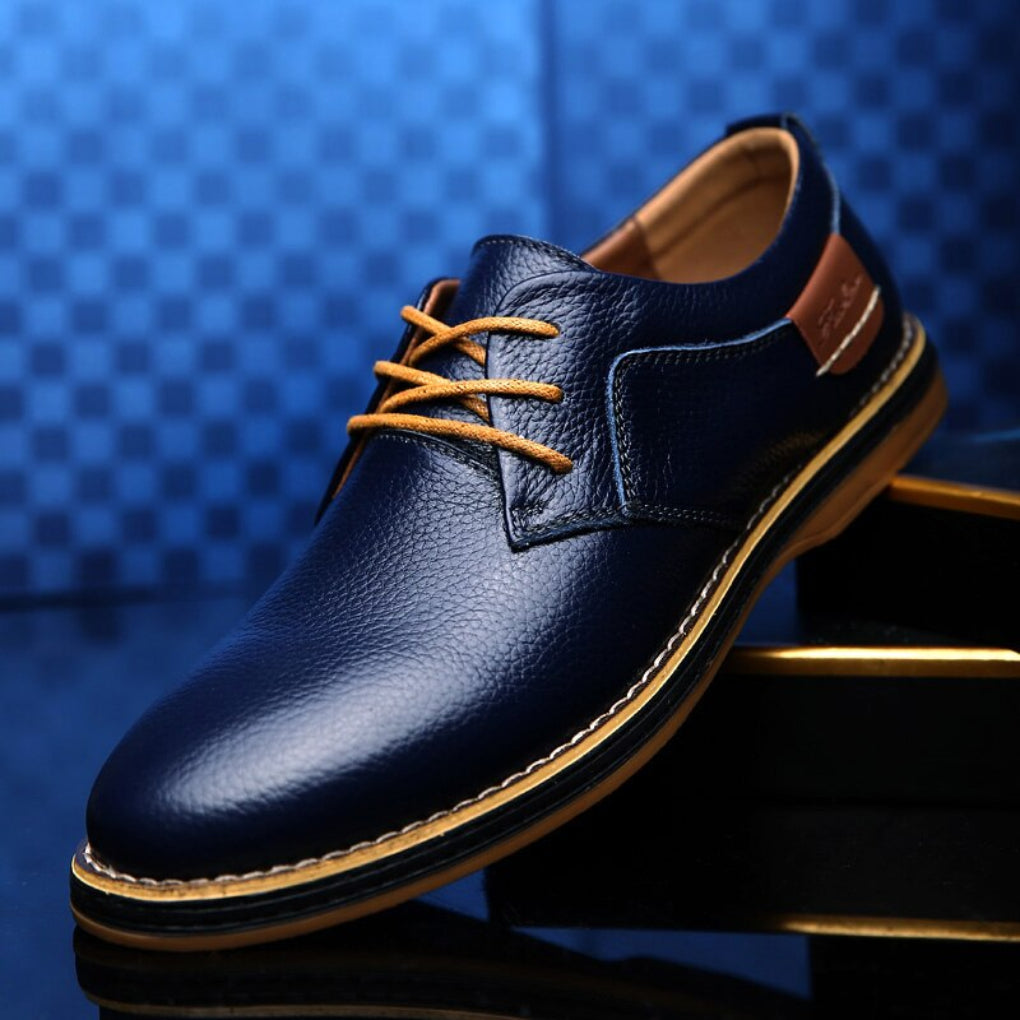 Elegant men's brown waterproof Oxford shoes, perfect for smart casual or formal wear, combining durability with classic style.
