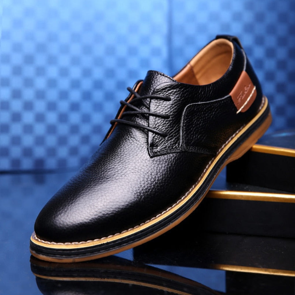 Stylish men's classic Oxford dress shoes in dark brown, ideal for business meetings and formal occasions, ensuring comfort.