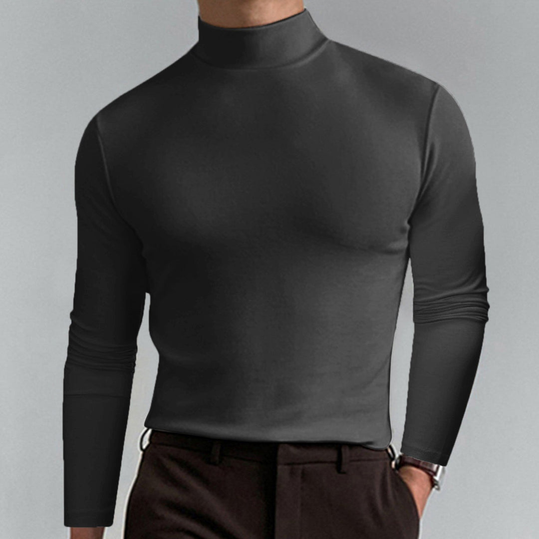 Detailed view of the fine knit fabric on a men's warm turtleneck sweater, emphasizing quality.