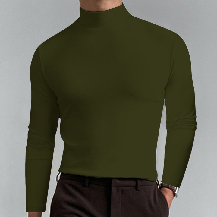 Navy blue men's turtleneck sweater. Versatile long sleeve knit top, perfect for smart casual winter fashion.
