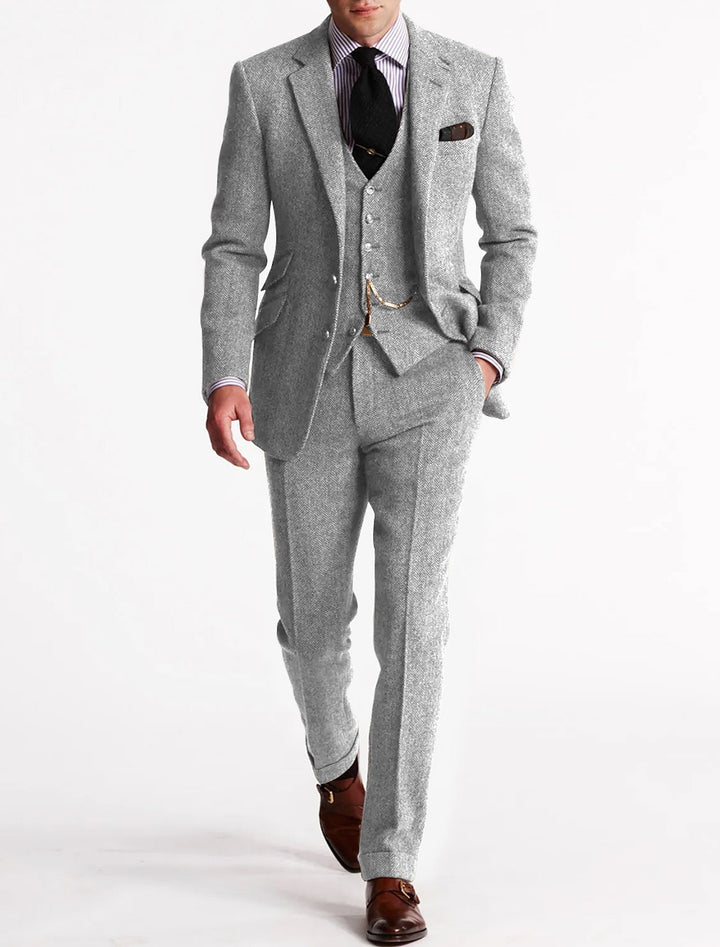 Sophisticated men's brown herringbone suit; a timeless 3-piece ensemble for elegant formal wear.