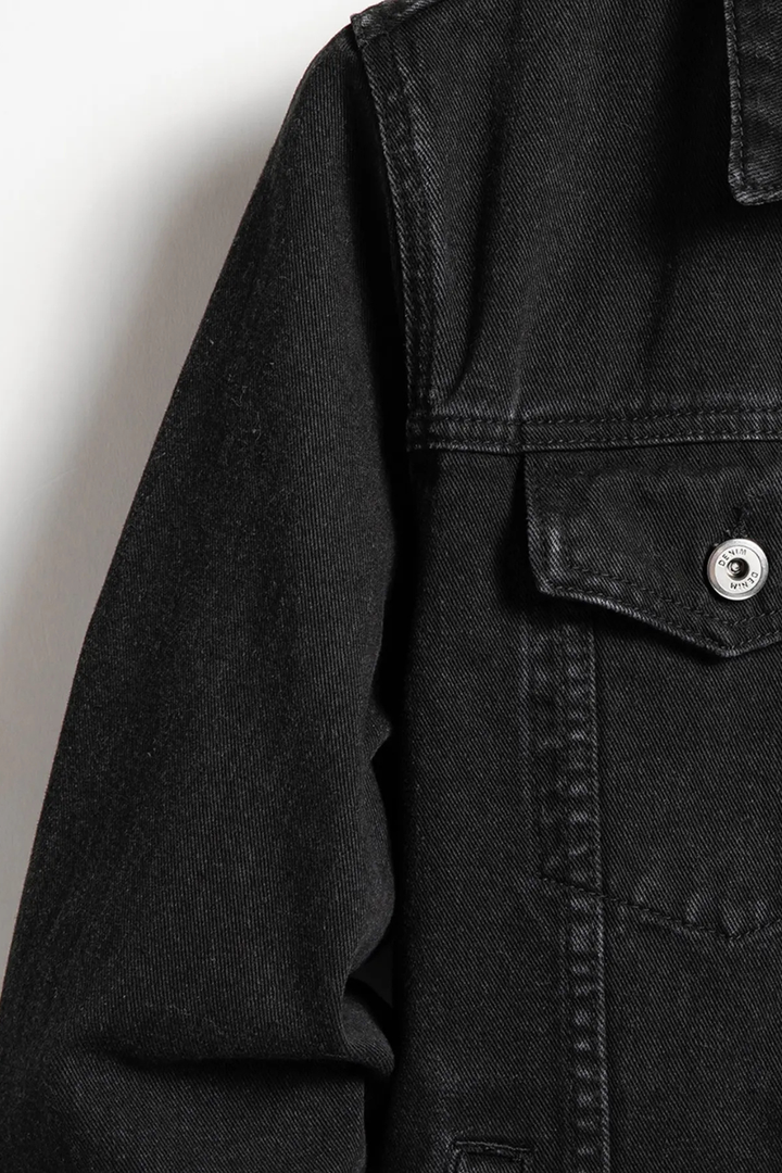 Stylish men's classic fit button-up denim jacket. Timeless outerwear for versatile casual and everyday looks.
