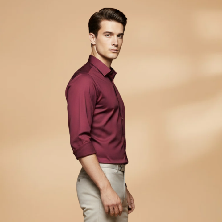 Man wearing a stylish long sleeve button-down shirt for a smart casual office look.
