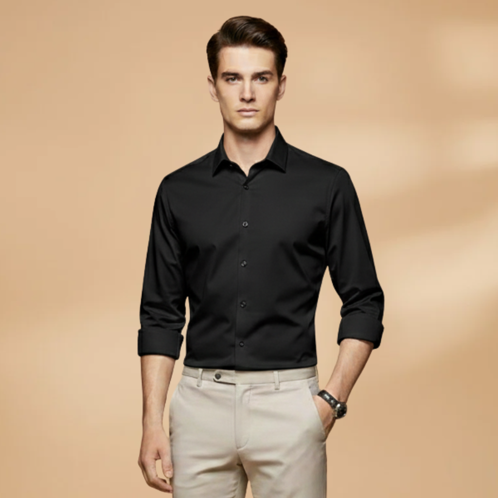 Detail of the cuff on a men's long sleeve button-down shirt, classic and functional.