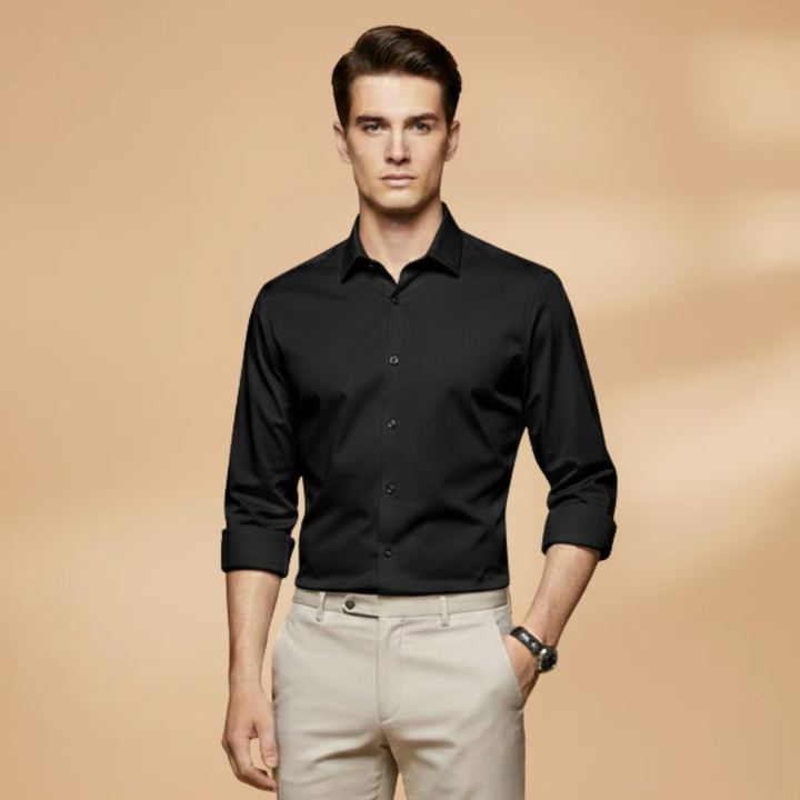 Detail of the cuff on a men's long sleeve button-down shirt, classic and functional.