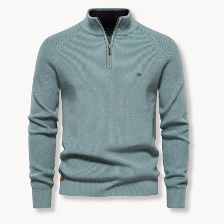 Model wearing a men's comfortable half-zip ribbed sweater in grey, showcasing its versatile fit & stylish appeal. Winter layering.
