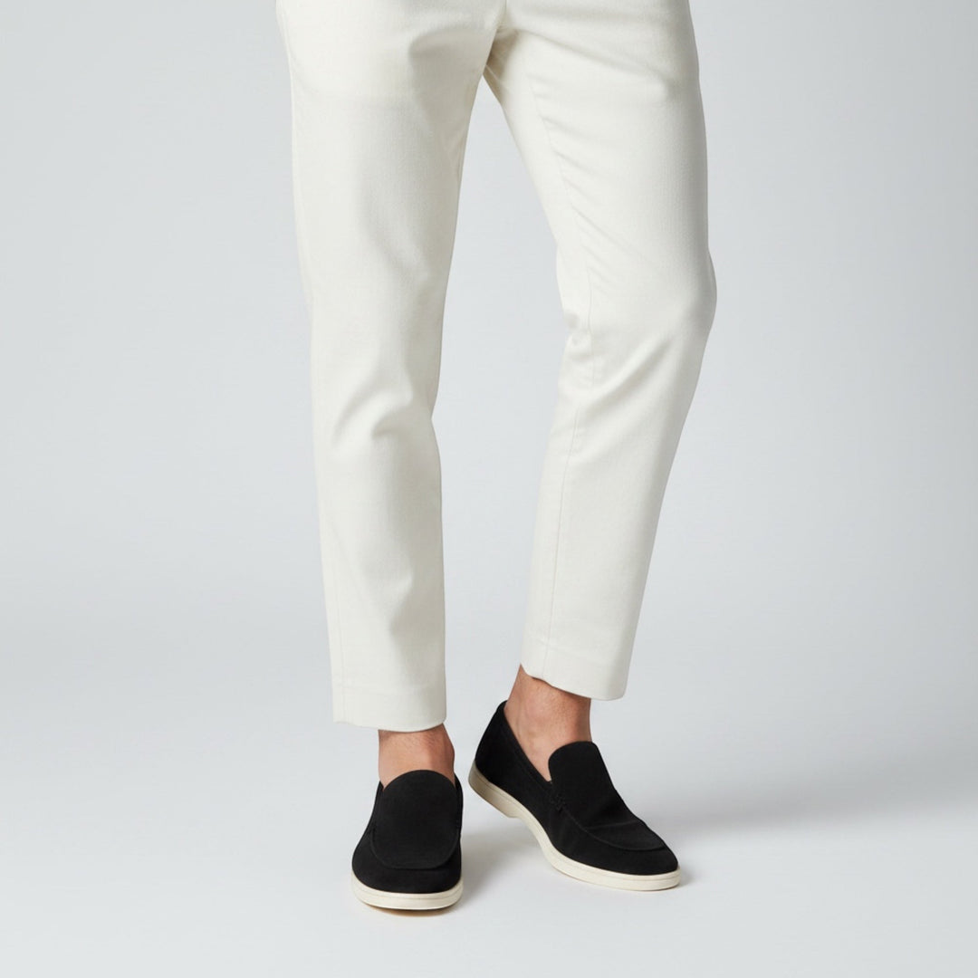 Modern men's slip-on loafers, stylish summer footwear for a sophisticated casual or smart-casual look.