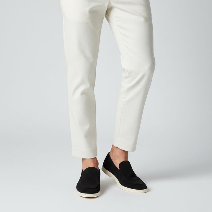 Modern men's slip-on loafers, stylish summer footwear for a sophisticated casual or smart-casual look.