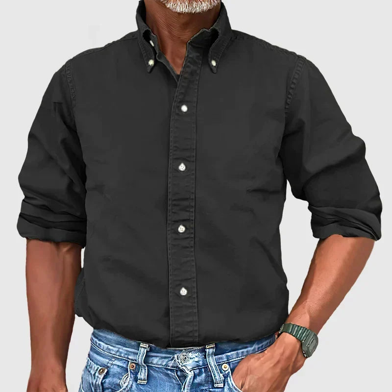 Stylish men's formal long-sleeve shirt with a crisp collar, ideal for office or events.