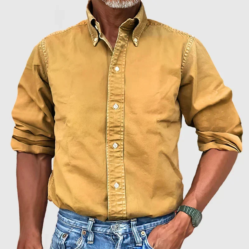 Crisp white men's classic long-sleeve shirt, a wardrobe essential for sophisticated styling.