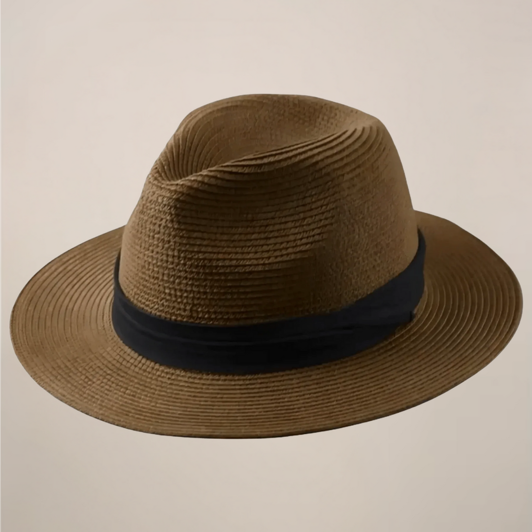 Stylish men's wide-brim Panama hat, an essential lightweight travel accessory for summer vacations.