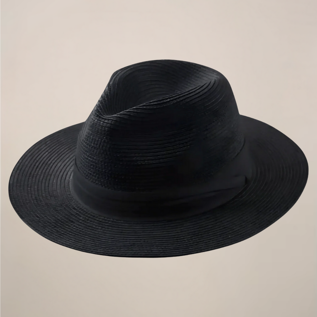 Handwoven straw men's Panama hat, featuring a wide brim for comfortable, classic summer sun protection.