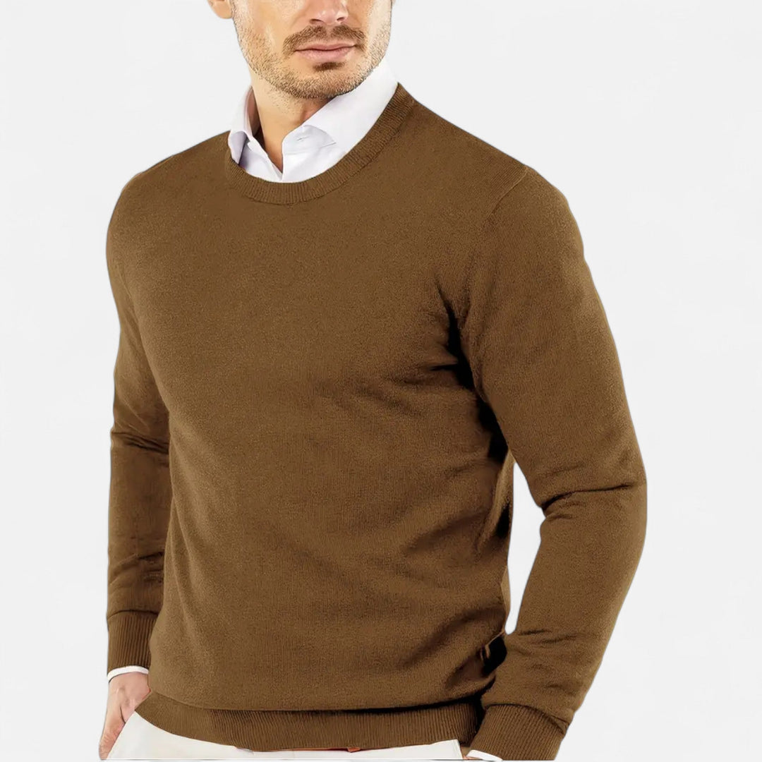 Sleek men's round neck knit sweater. Comfortable long sleeve pullover for everyday casual style.