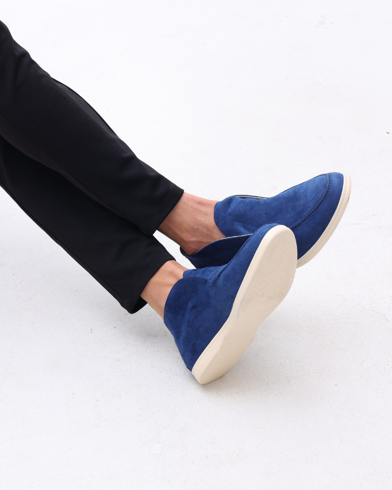 Men's classic slip-on loafers in a dark finish, perfect for effortless smart casual style and everyday comfort.