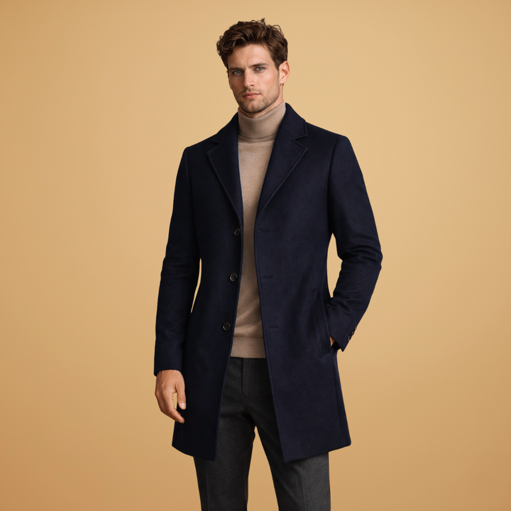 Side profile of men's elegant classic tailored overcoat with long sleeve. Formal & business casual outerwear.