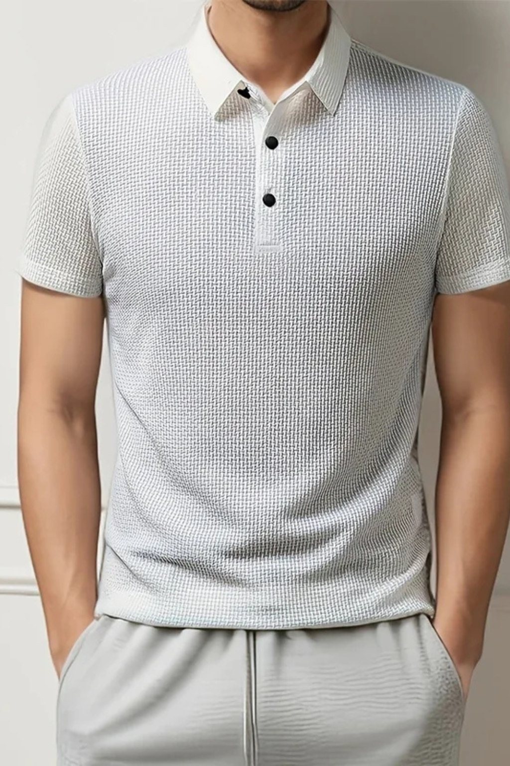 Durable men's textured short sleeve polo with classic button placket, great for casual & everyday wear.