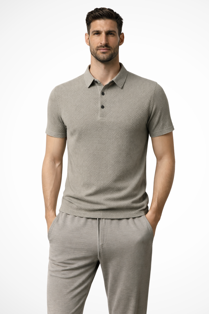 Breathable textured short sleeve men's polo shirt, a classic menswear essential for warm weather style.