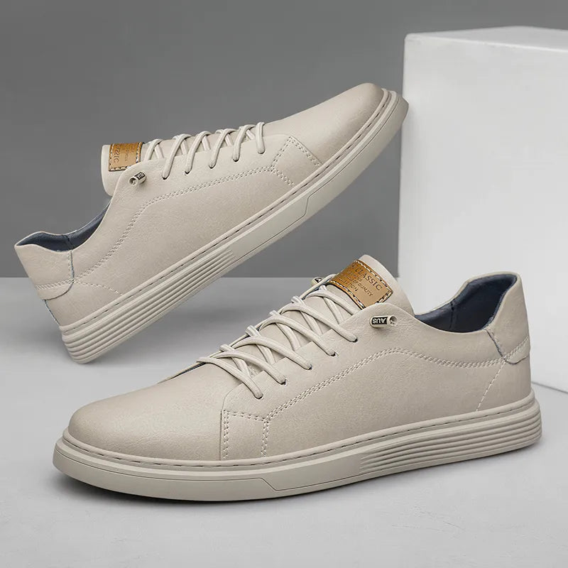 Men's classic white lace-up sneakers, designed for all-day comfort. Versatile casual footwear for everyday wear.