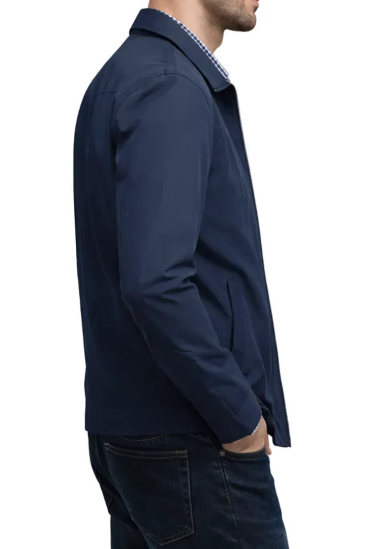 Zip-up men's Harrington jacket with classic collar and fashionable check lining; essential versatile outerwear.