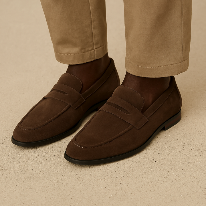 Versatile men's penny loafers. Slip-on style transitions from casual to formal wear with ease.