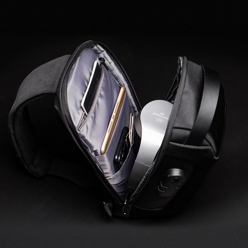 Versatile men's compact sling bag, anti-theft protection & integrated USB port for modern lifestyle.