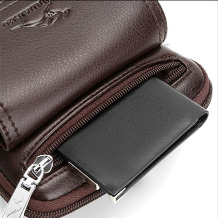 Small black PU leather crossbody bag for men, with an adjustable strap, great for minimalist daily carry.