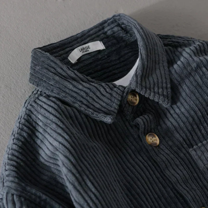 Stylish men's corduroy shirt with a textured finish, a timeless collared button-down for comfort.