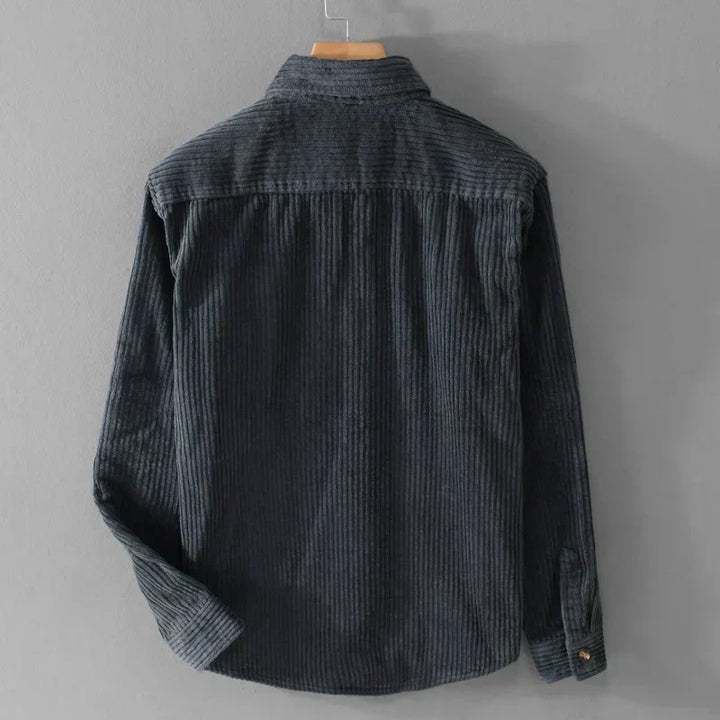 Man wearing a comfortable, stylish men's long sleeve corduroy shirt, perfect for everyday fashion.