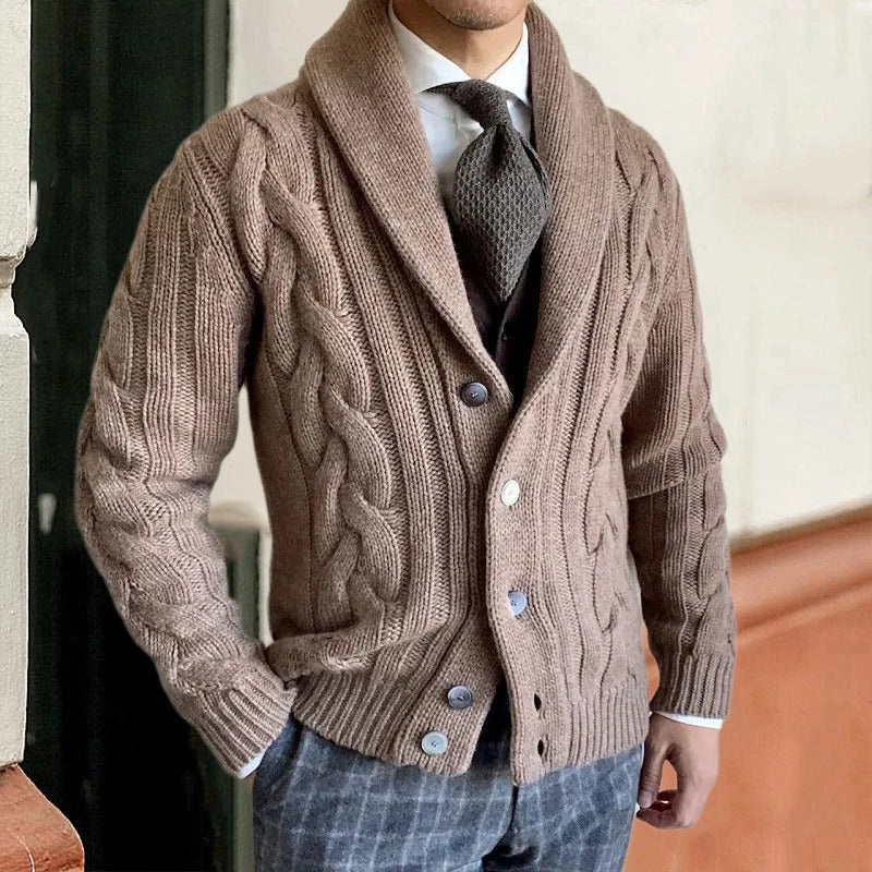Men's cozy cable knit sweater with a stylish shawl collar and button front, perfect for warm winter fashion.