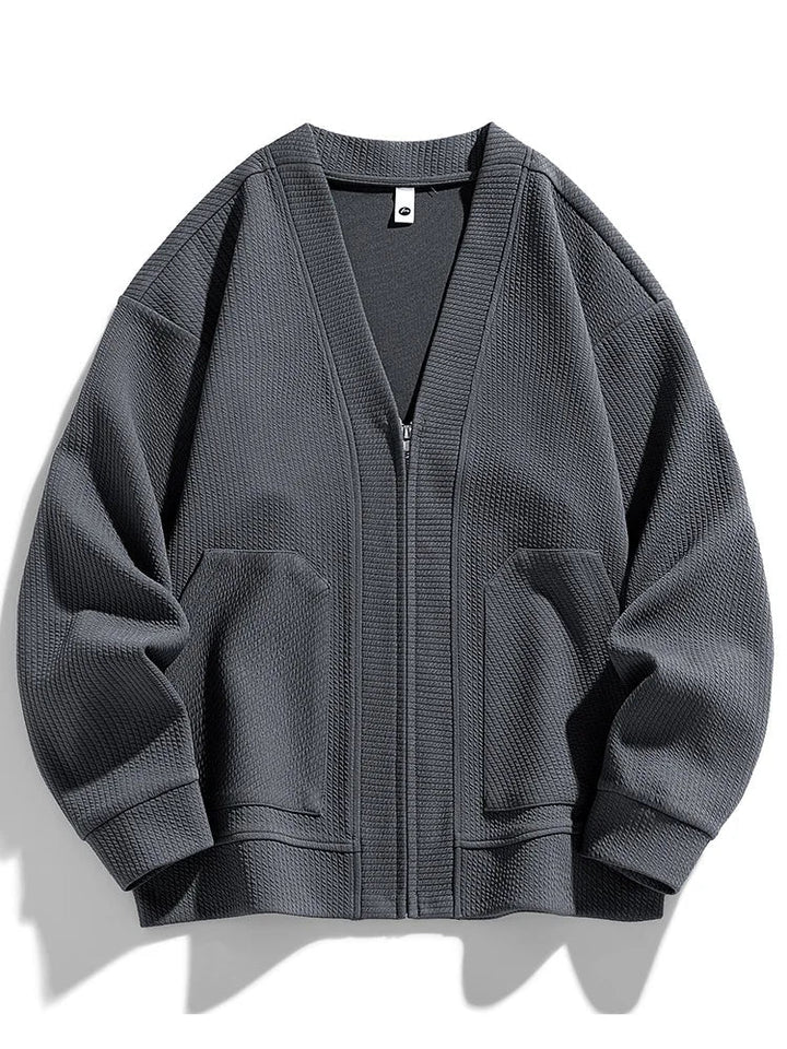 Warm men's full-zip cardigan sweater in a comfortable stretch knit for casual winter wear.
